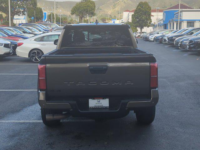 used 2024 Toyota Tacoma car, priced at $41,999