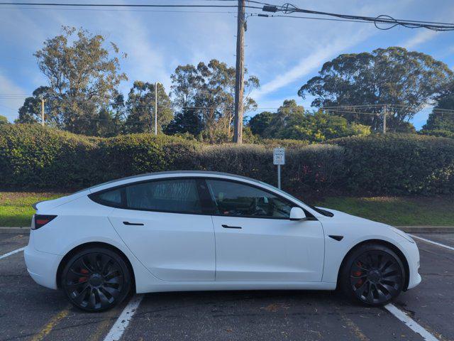 used 2023 Tesla Model 3 car, priced at $34,999