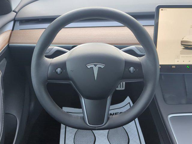 used 2023 Tesla Model 3 car, priced at $34,999