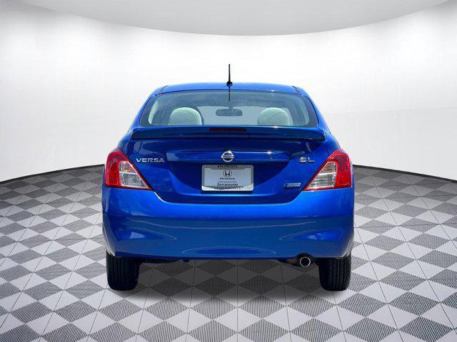 used 2013 Nissan Versa car, priced at $5,288