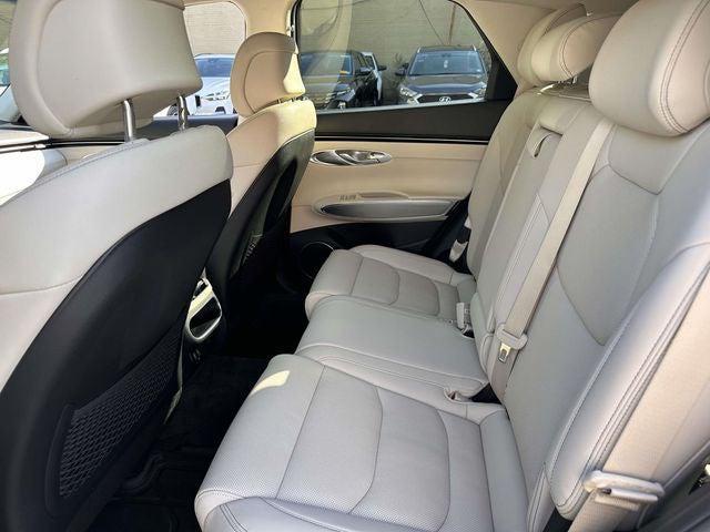used 2023 Genesis GV70 car, priced at $34,600