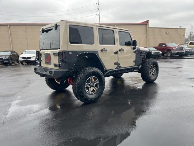 used 2016 Jeep Wrangler Unlimited car, priced at $25,988