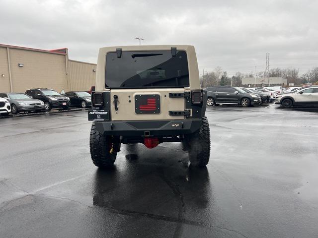 used 2016 Jeep Wrangler Unlimited car, priced at $25,988