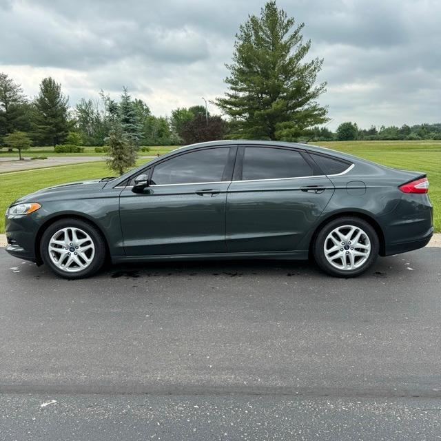 used 2015 Ford Fusion car, priced at $8,900