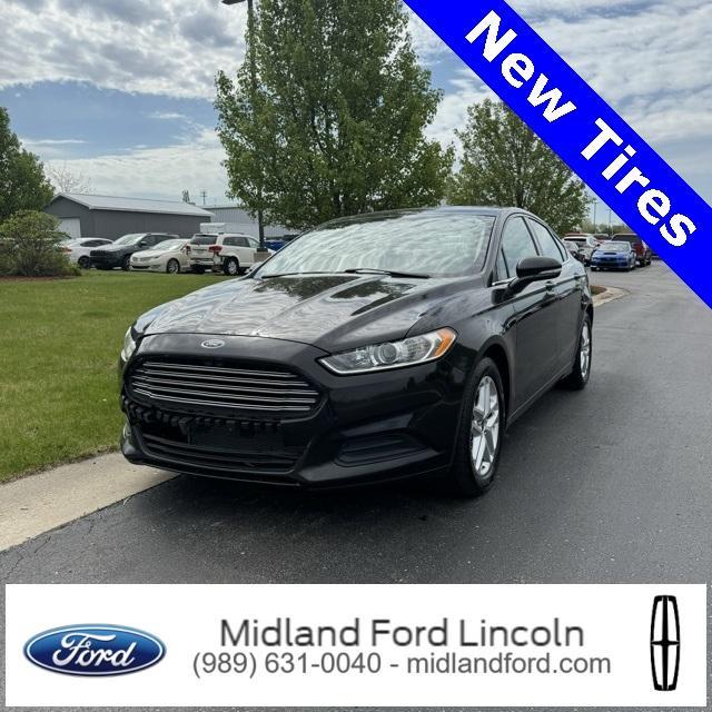used 2014 Ford Fusion car, priced at $7,900