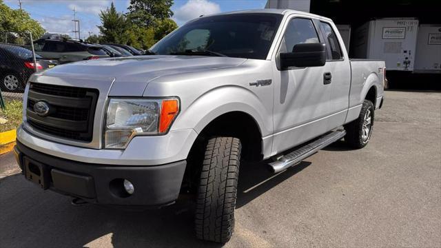 used 2014 Ford F-150 car, priced at $10,999