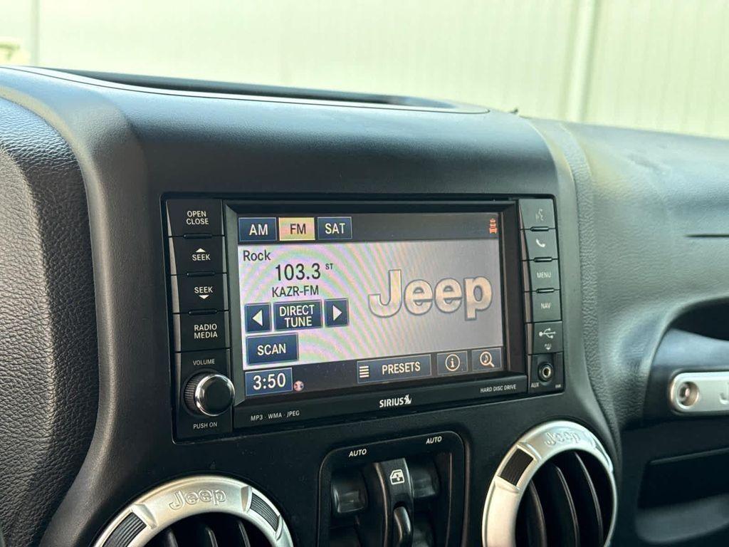 used 2013 Jeep Wrangler Unlimited car, priced at $17,999