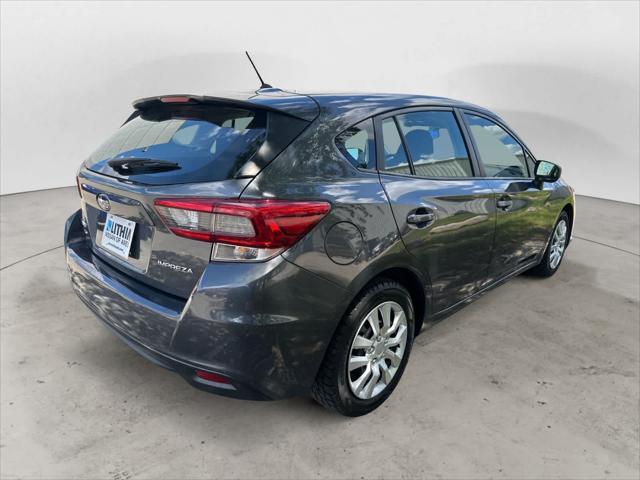 used 2023 Subaru Impreza car, priced at $16,999