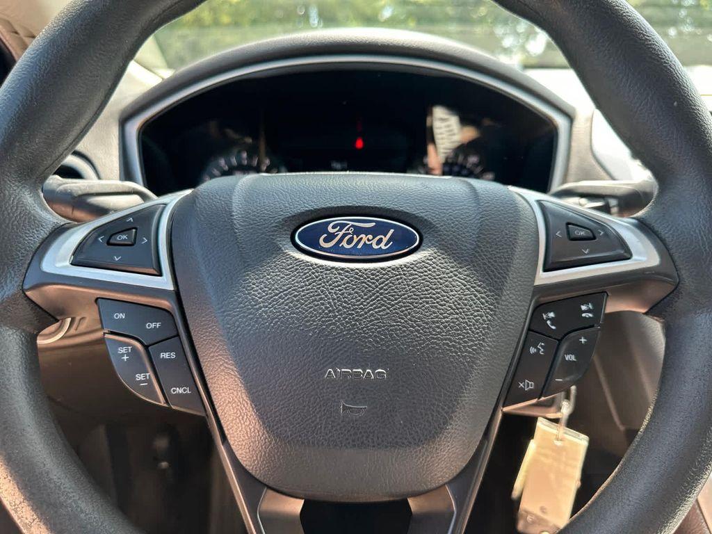 used 2014 Ford Fusion car, priced at $9,999