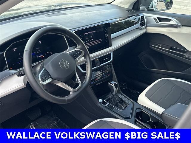 used 2025 Volkswagen Taos car, priced at $25,250