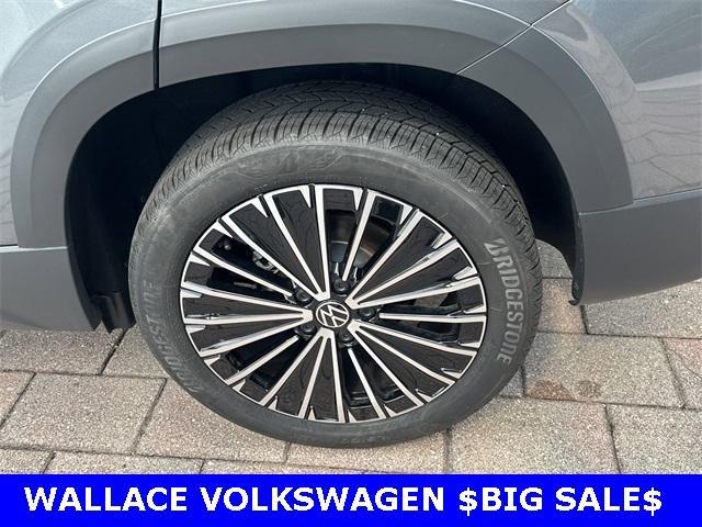 used 2025 Volkswagen Taos car, priced at $25,250