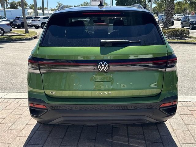 new 2025 Volkswagen Taos car, priced at $33,021