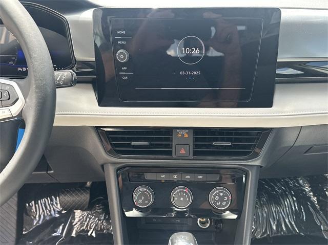 new 2025 Volkswagen Taos car, priced at $27,011