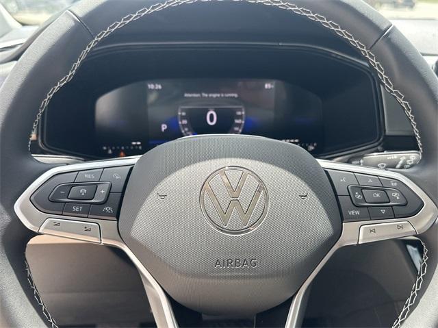 new 2025 Volkswagen Taos car, priced at $27,011