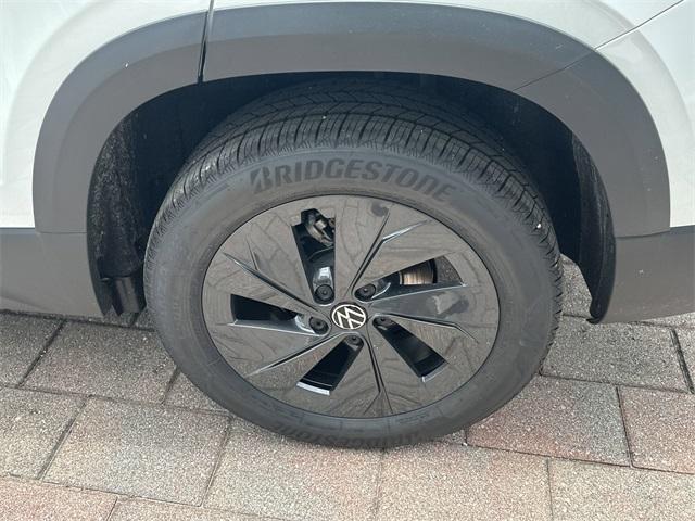 new 2025 Volkswagen Taos car, priced at $27,011