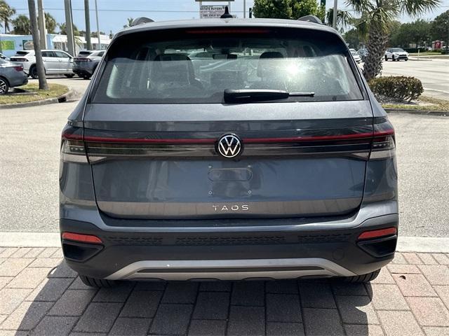 new 2025 Volkswagen Taos car, priced at $27,011