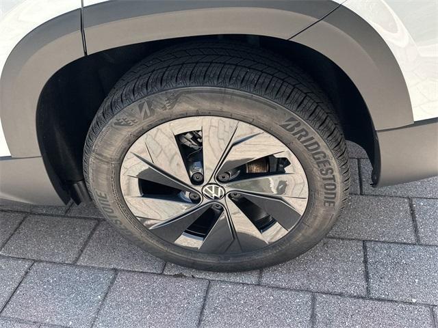 new 2025 Volkswagen Taos car, priced at $27,011