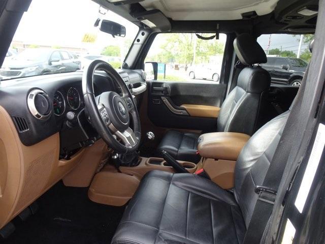 used 2011 Jeep Wrangler Unlimited car, priced at $16,995