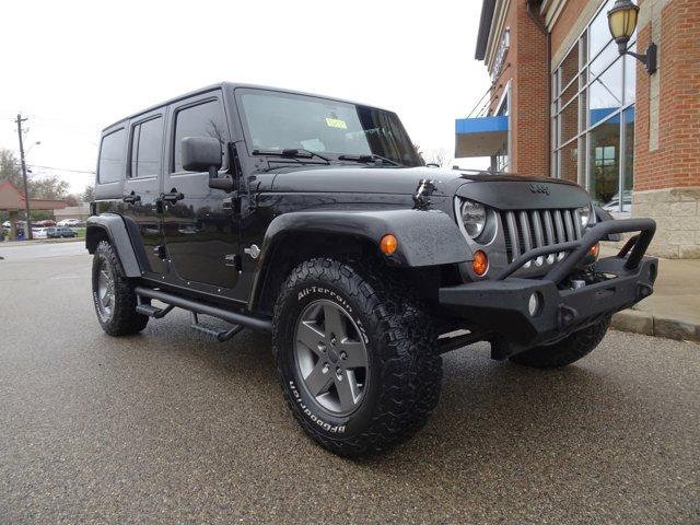 used 2013 Jeep Wrangler Unlimited car, priced at $15,075