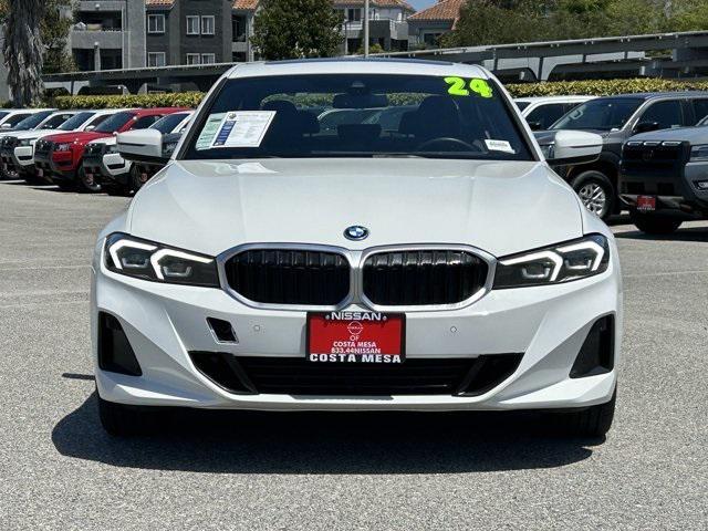 used 2024 BMW 330e car, priced at $37,140