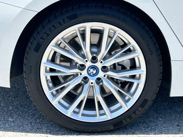used 2024 BMW 330e car, priced at $37,140
