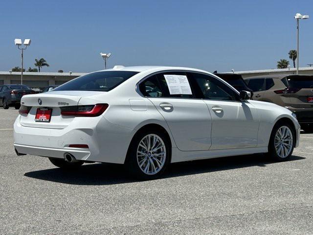 used 2024 BMW 330e car, priced at $37,140