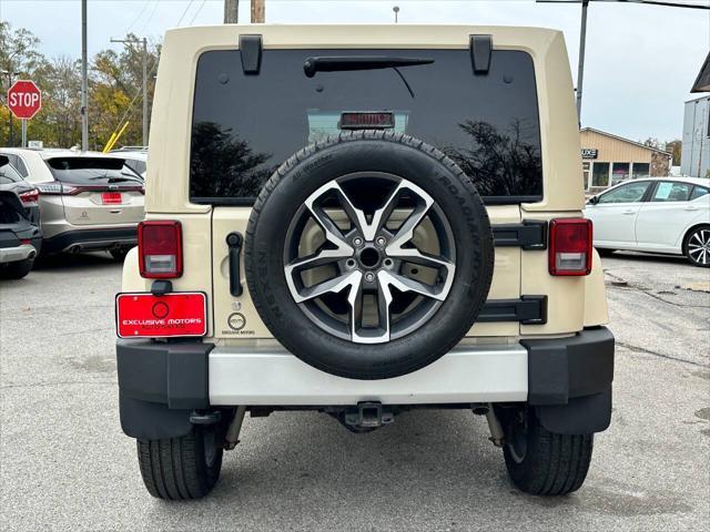 used 2011 Jeep Wrangler Unlimited car, priced at $14,950