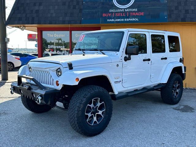 used 2013 Jeep Wrangler Unlimited car, priced at $17,950