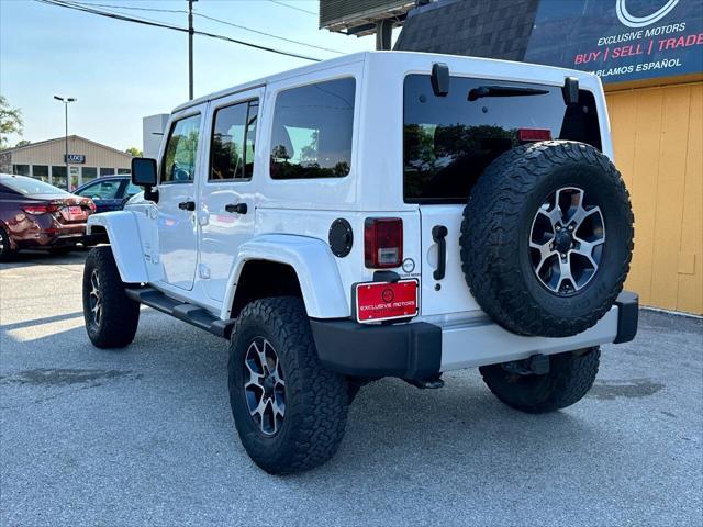 used 2013 Jeep Wrangler Unlimited car, priced at $17,950