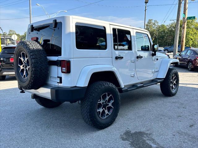 used 2013 Jeep Wrangler Unlimited car, priced at $17,950