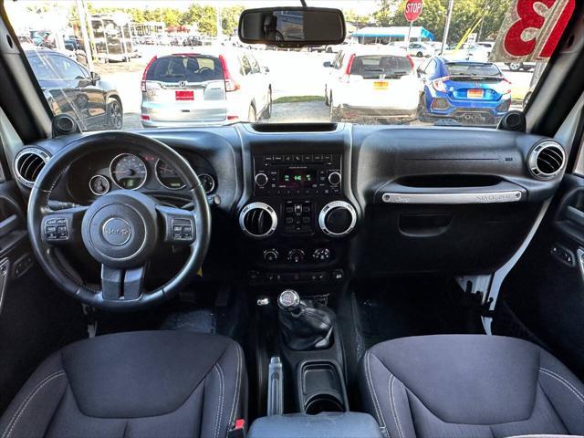 used 2013 Jeep Wrangler Unlimited car, priced at $17,950