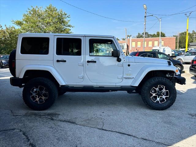 used 2013 Jeep Wrangler Unlimited car, priced at $17,950