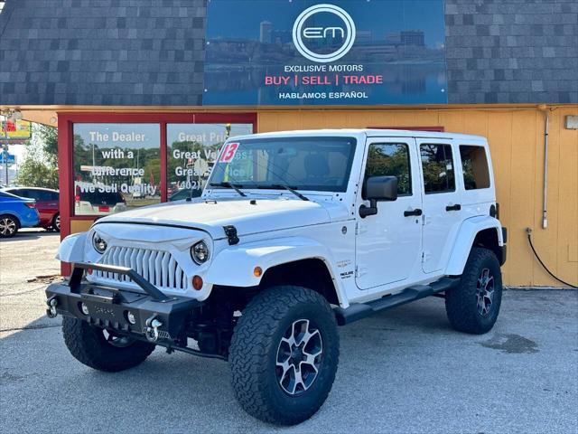 used 2013 Jeep Wrangler Unlimited car, priced at $17,950