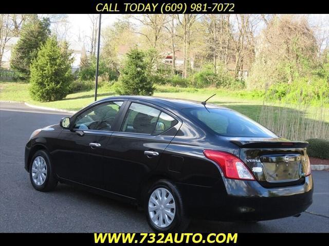 used 2013 Nissan Versa car, priced at $5,900