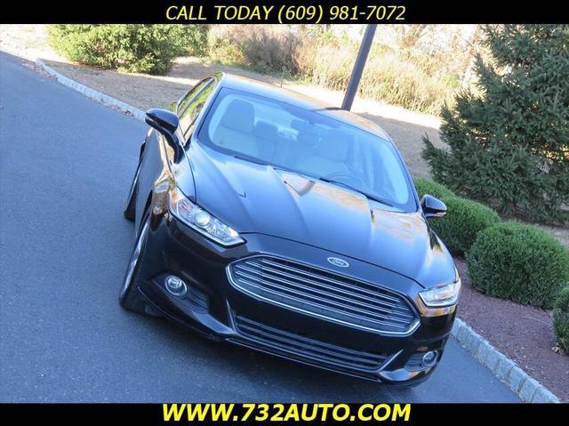 used 2016 Ford Fusion car, priced at $7,500