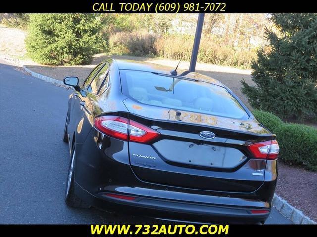 used 2016 Ford Fusion car, priced at $7,500