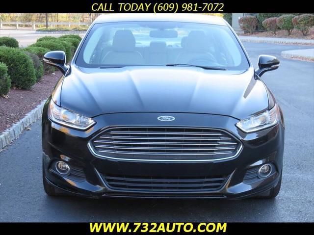 used 2016 Ford Fusion car, priced at $7,500