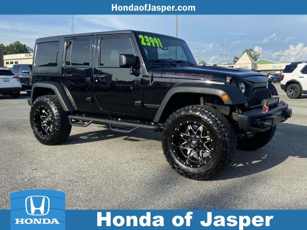 used 2016 Jeep Wrangler Unlimited car, priced at $22,991