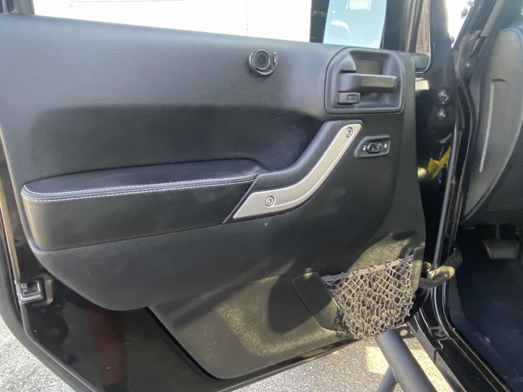 used 2016 Jeep Wrangler Unlimited car, priced at $22,991