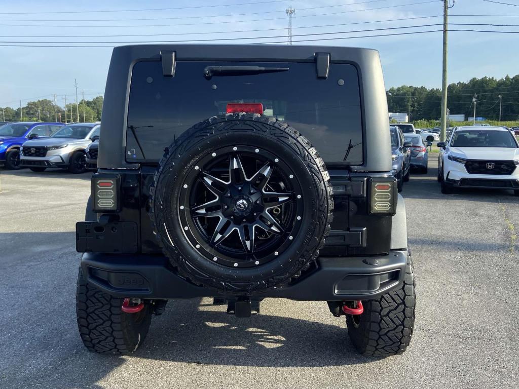 used 2016 Jeep Wrangler Unlimited car, priced at $22,991