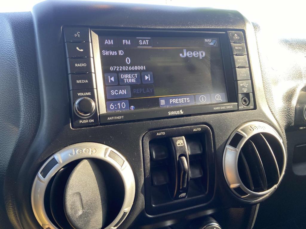 used 2016 Jeep Wrangler Unlimited car, priced at $22,991