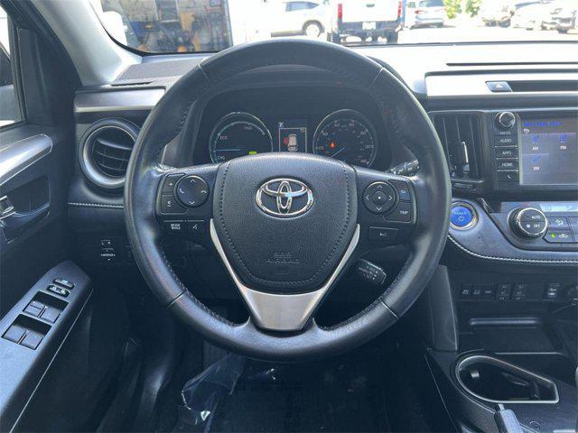 used 2018 Toyota RAV4 Hybrid car, priced at $23,400