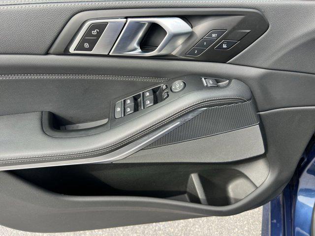 used 2023 BMW X5 car, priced at $62,000