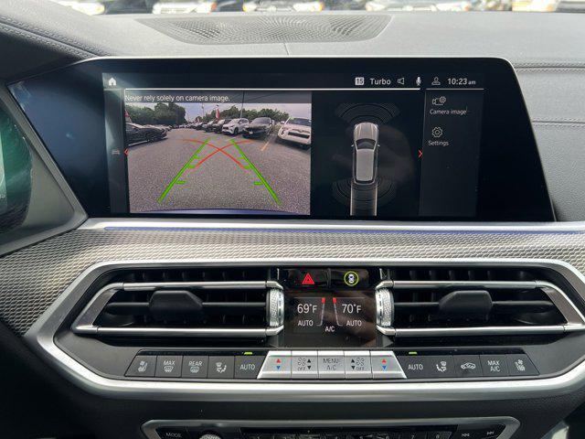 used 2023 BMW X5 car, priced at $62,000