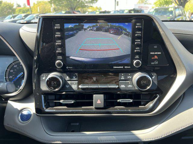 used 2021 Toyota Highlander Hybrid car, priced at $32,885
