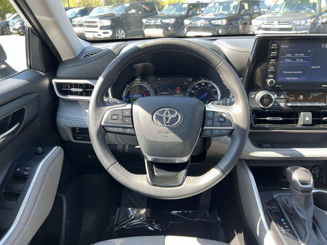 used 2021 Toyota Highlander Hybrid car, priced at $32,885