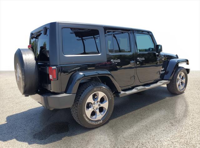 used 2016 Jeep Wrangler Unlimited car, priced at $17,400