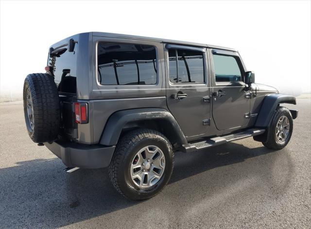 used 2018 Jeep Wrangler JK Unlimited car, priced at $27,932