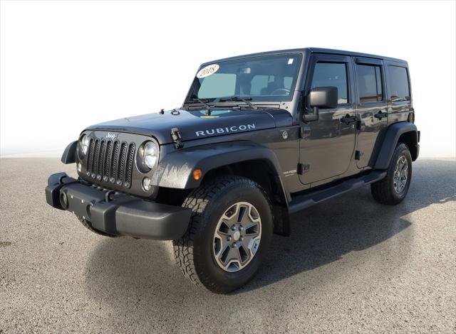 used 2018 Jeep Wrangler JK Unlimited car, priced at $27,932