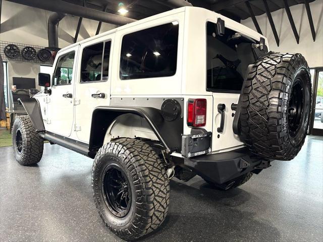 used 2012 Jeep Wrangler Unlimited car, priced at $25,990